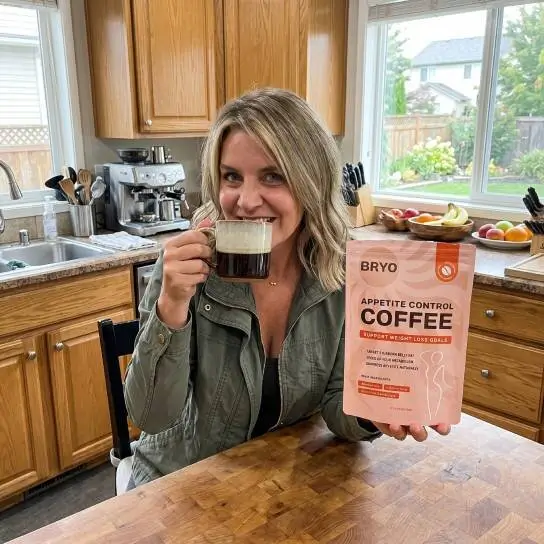Customer enjoying BRYO Coffee at home with the product pouch